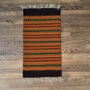 Handwoven MCM orange, brown, and green Striped wall hanging